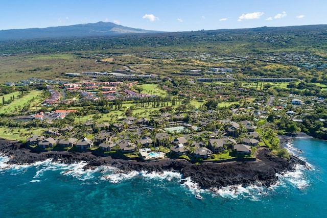 birds eye view of property featuring a water and mountain view