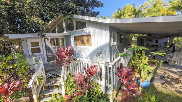 view of front of property with a carport