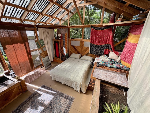 sunroom / solarium with plenty of natural light and vaulted ceiling