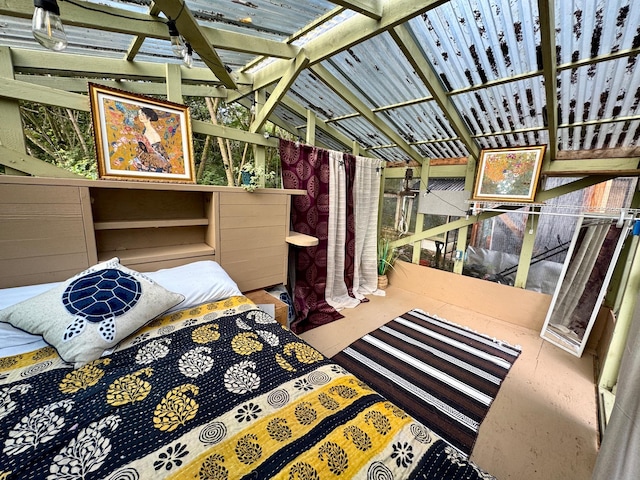 bedroom featuring vaulted ceiling