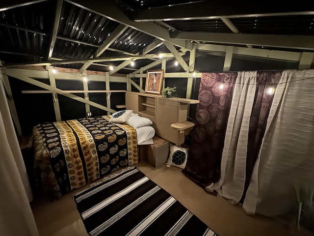 bedroom featuring vaulted ceiling