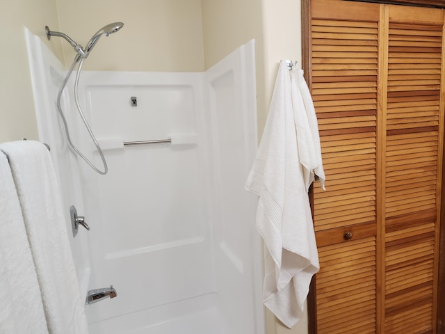 bathroom with a shower with shower curtain