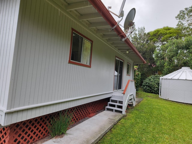 view of property exterior featuring a yard