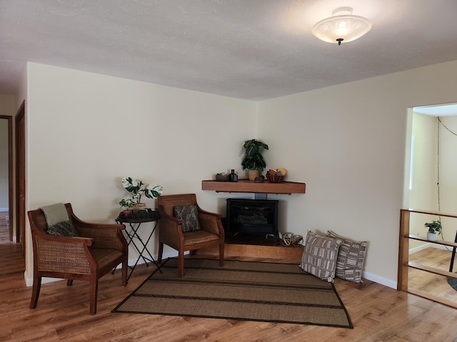 living area featuring hardwood / wood-style flooring