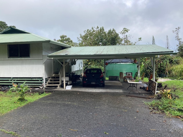 view of parking featuring a carport