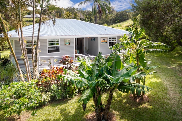 exterior space with a front yard