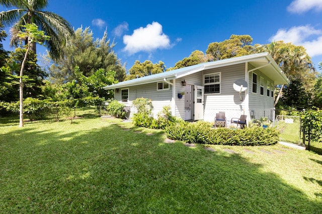 view of front facade with a front lawn