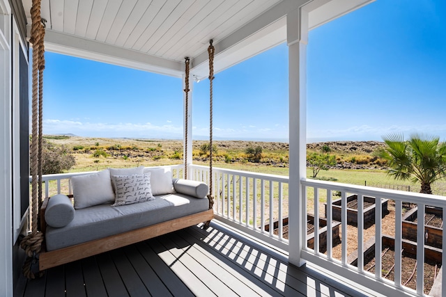 wooden deck featuring an outdoor hangout area