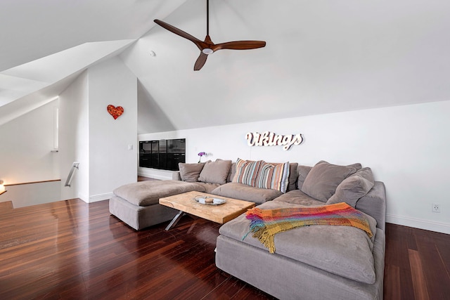 living room featuring dark wood-type flooring, ceiling fan, and lofted ceiling