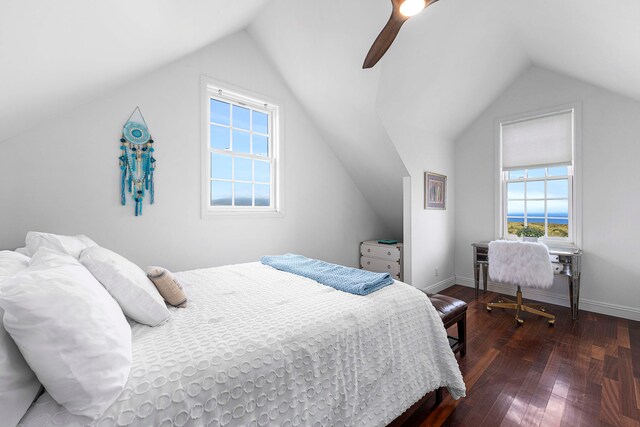 bedroom with dark wood-type flooring, ceiling fan, and vaulted ceiling