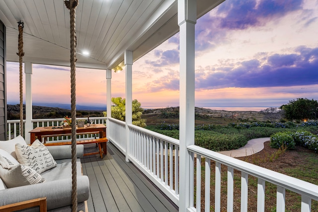 view of deck at dusk