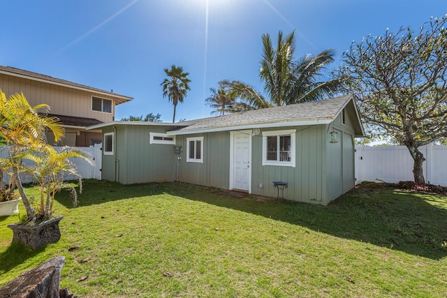 4463 Makaha Rd, Kapaa, HI 96746 - rear view of property featuring a lawn