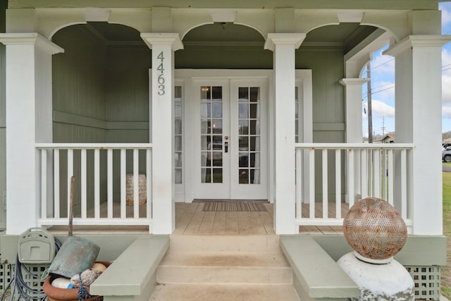 entrance to property featuring french doors