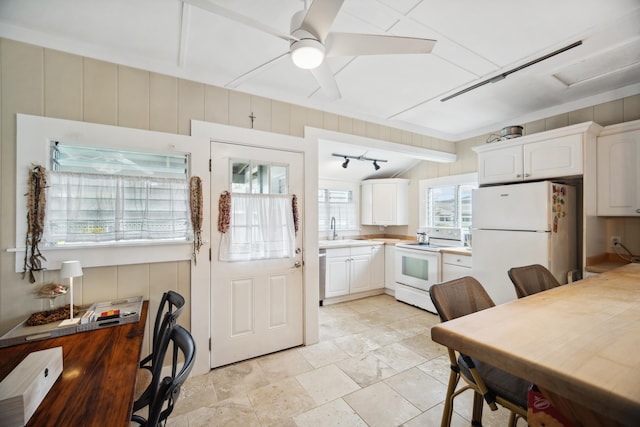 4463 Makaha Rd, Kapaa, HI 96746 - kitchen featuring ceiling fan, sink, white cabinets, and white appliances