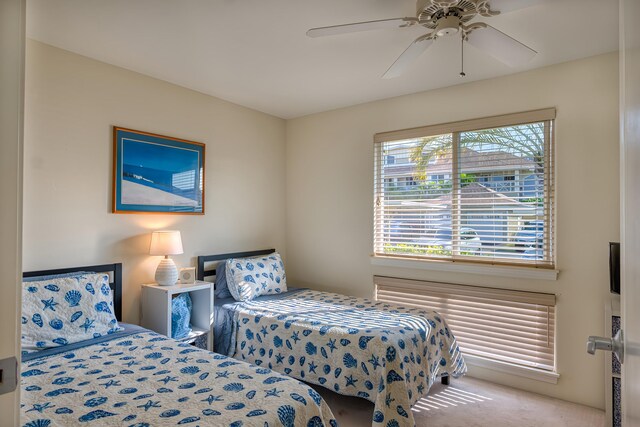 bedroom featuring carpet floors and ceiling fan