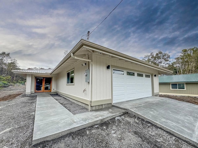 view of home's exterior with a garage