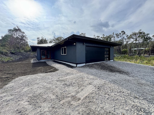 view of property exterior with a garage