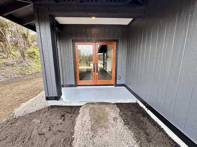 property entrance featuring french doors