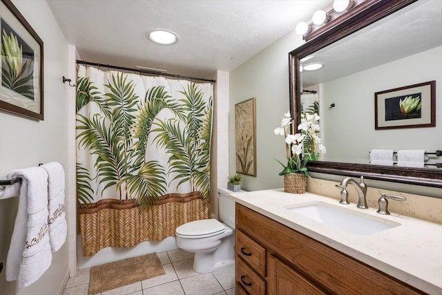 bathroom featuring a shower with curtain, tile patterned floors, toilet, and vanity