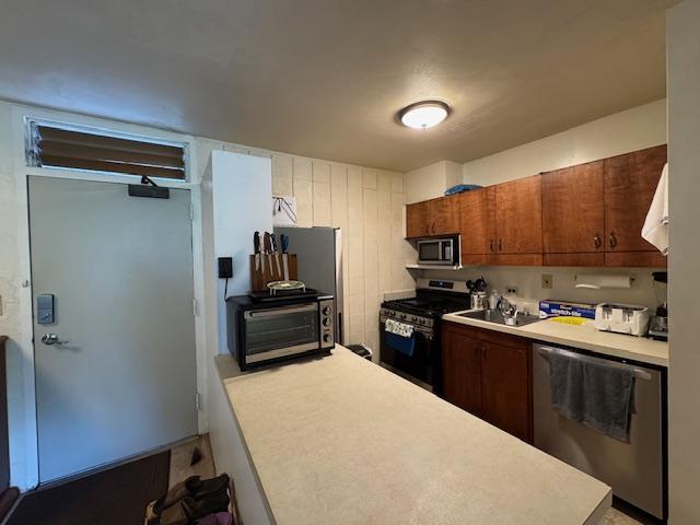 kitchen with stainless steel appliances and sink