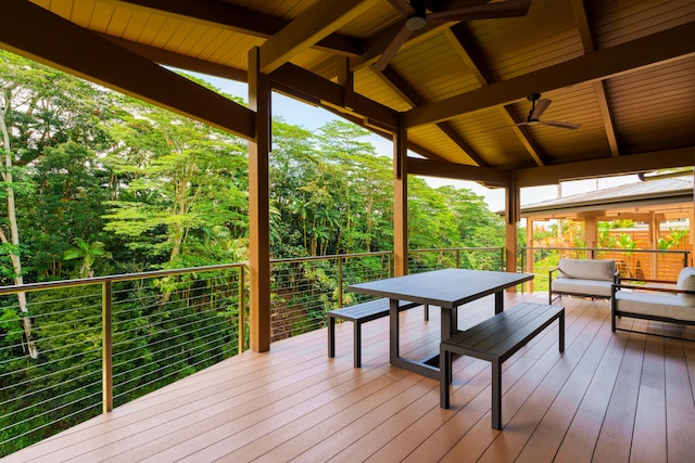 deck featuring an outdoor hangout area and ceiling fan