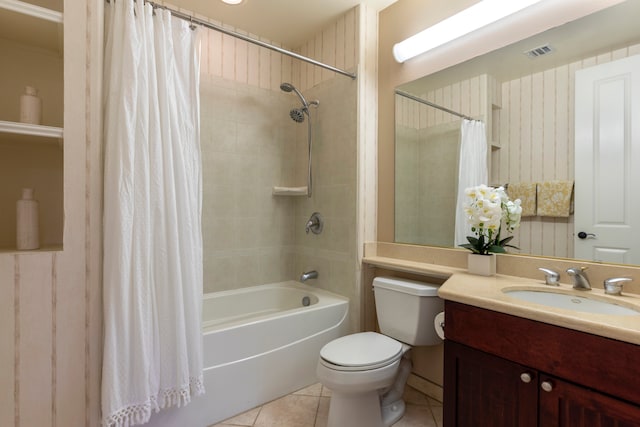 full bathroom with shower / tub combo, vanity, tile patterned floors, and toilet