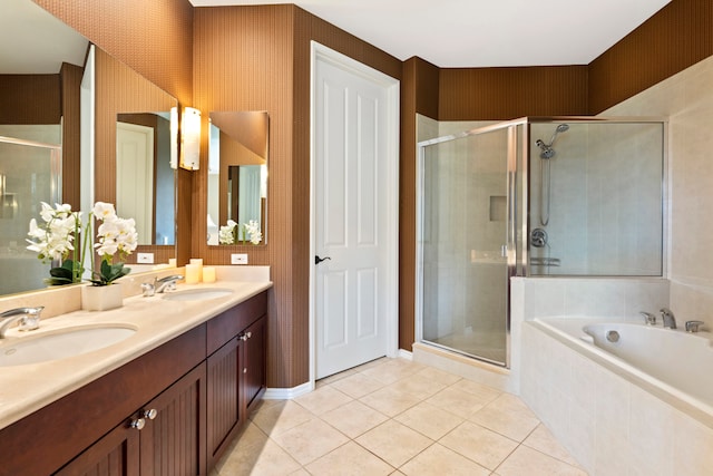 bathroom featuring vanity, independent shower and bath, and tile patterned flooring