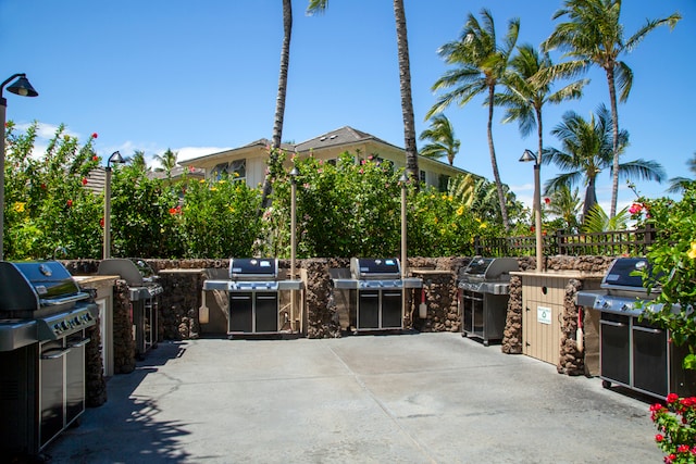 view of patio / terrace featuring area for grilling and a grill