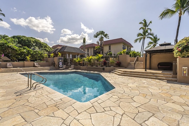 view of pool with a gazebo and a patio area