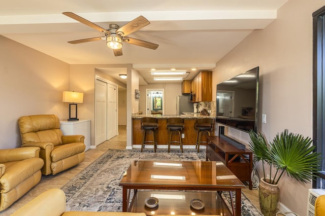 living room featuring ceiling fan