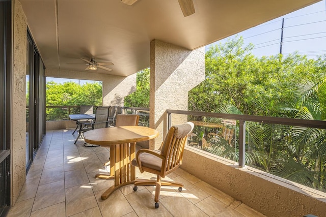 exterior space with a balcony and ceiling fan