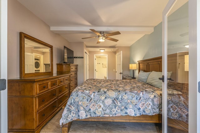 tiled bedroom with ceiling fan, connected bathroom, and beam ceiling