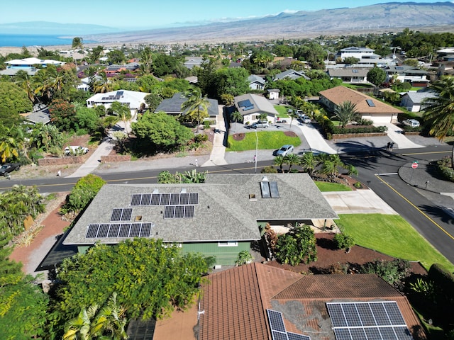 birds eye view of property featuring a mountain view