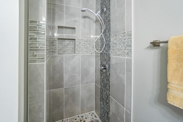 bathroom featuring a shower stall