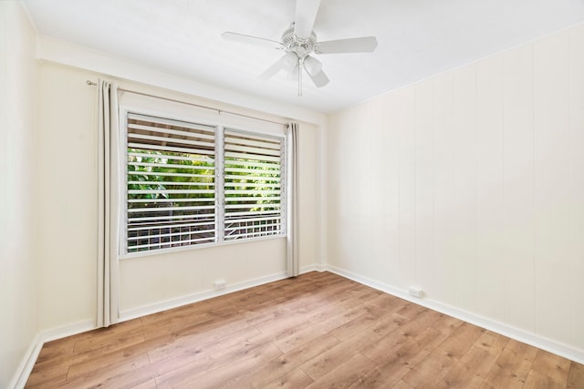 unfurnished room featuring ceiling fan and light hardwood / wood-style floors