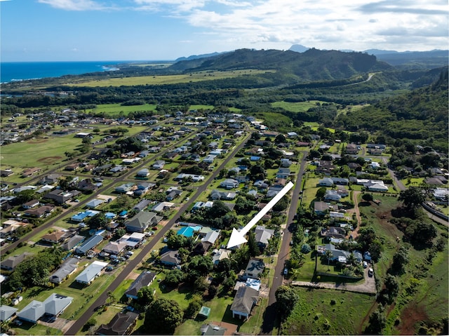 bird's eye view with a water and mountain view