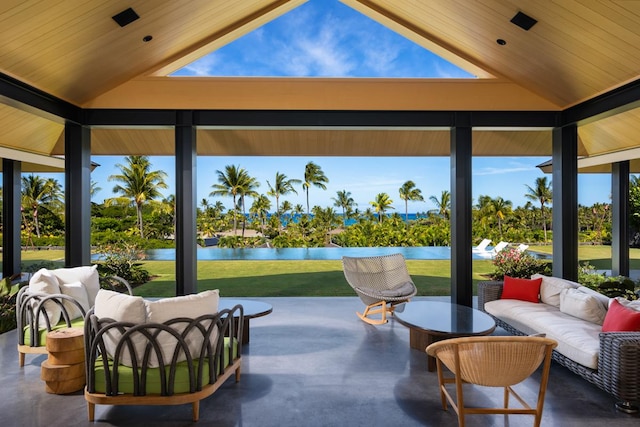 view of patio / terrace featuring an outdoor living space, a gazebo, and a water view