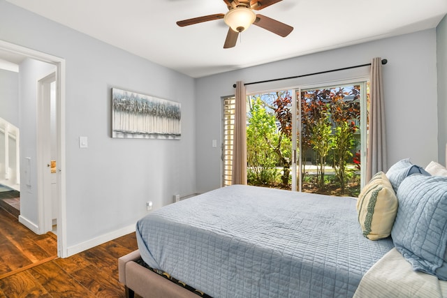 bedroom with ceiling fan, baseboards, and wood finished floors