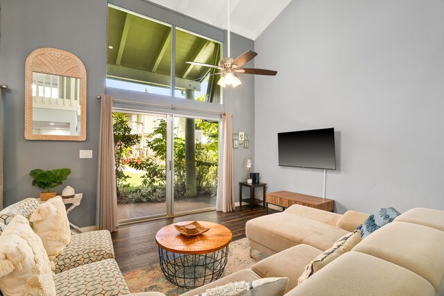 living room featuring ceiling fan, high vaulted ceiling, and wood finished floors