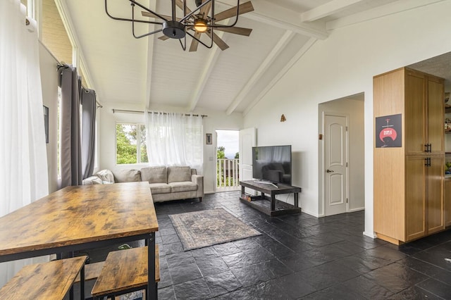 living room with ceiling fan, beam ceiling, and high vaulted ceiling