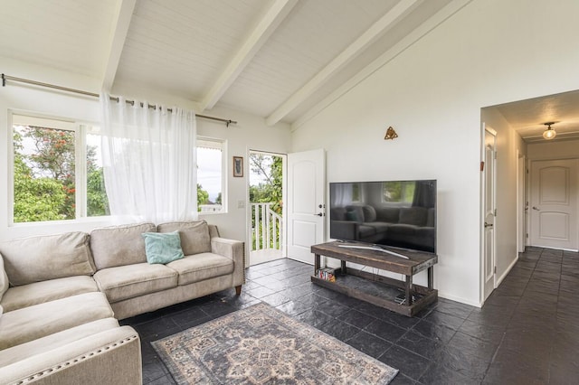 living room featuring beam ceiling and high vaulted ceiling