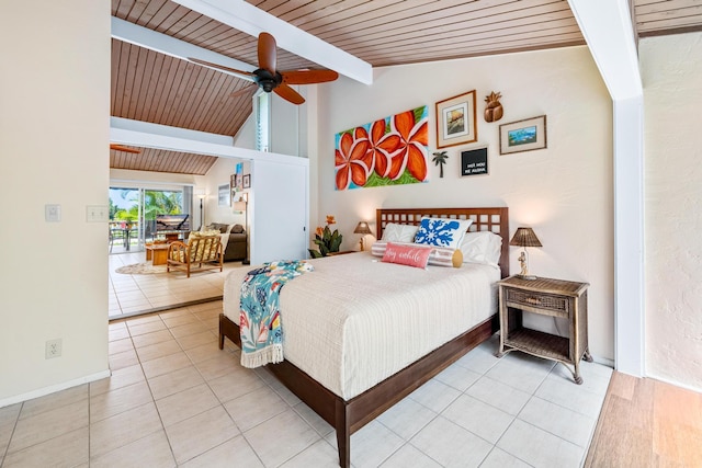 bedroom featuring light tile patterned floors, wood ceiling, and lofted ceiling with beams