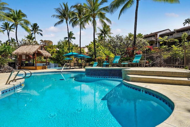 view of swimming pool with a gazebo and a patio