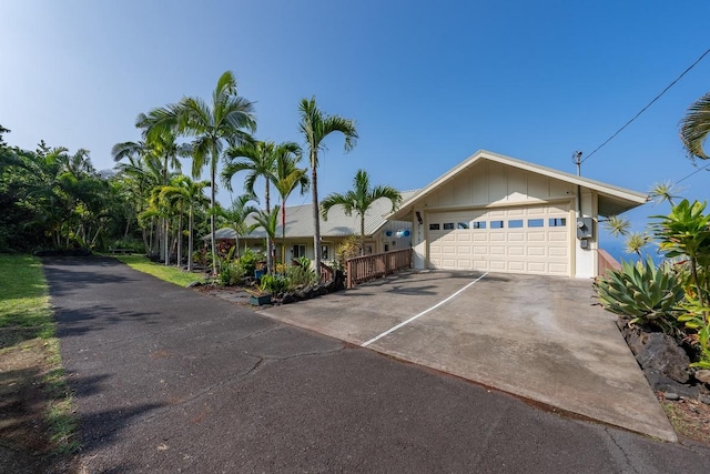 view of front of property with a garage