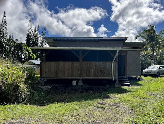 exterior space with a lawn