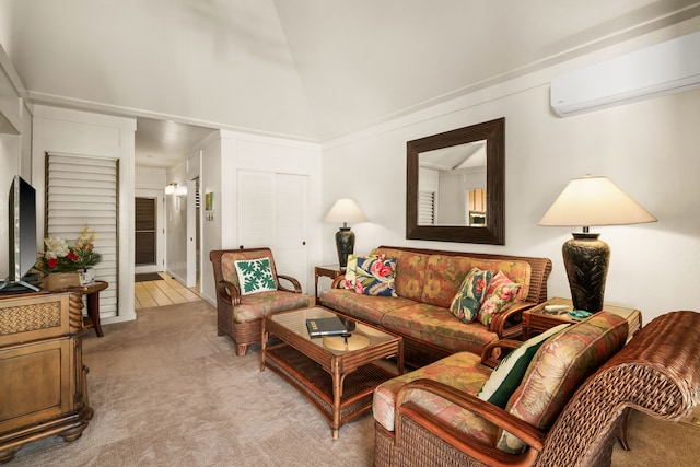 living room featuring an AC wall unit, light carpet, and high vaulted ceiling