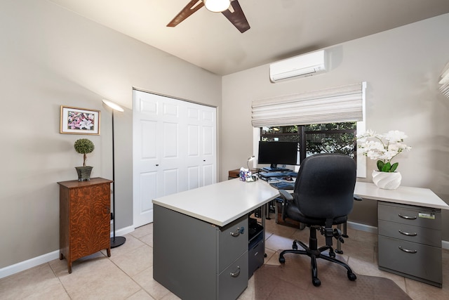 office area featuring light tile patterned floors, a wall unit AC, and ceiling fan