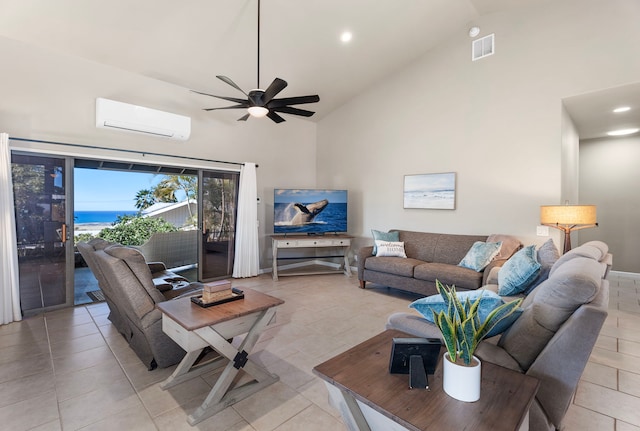 tiled living room with ceiling fan, a wall mounted AC, and high vaulted ceiling