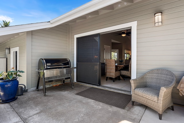 entrance to property with a patio