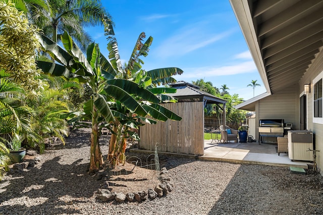 view of yard with a patio and a gazebo